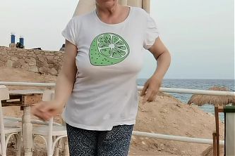 Granny Dancing on the Beach